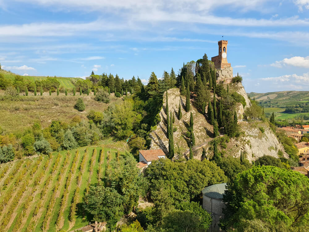 View of Brisighella's Torre dell'Orologio and rural setting