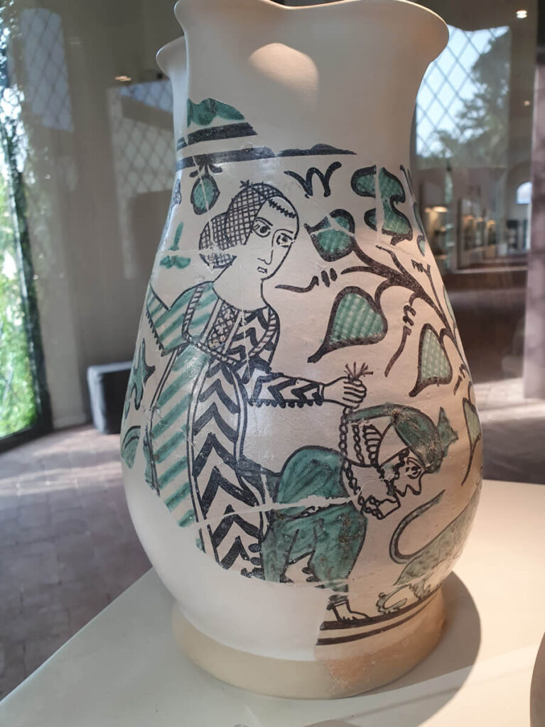 Illustration of the cautionary tale of Phyllis and Aristotle painted on a 14th-century jug