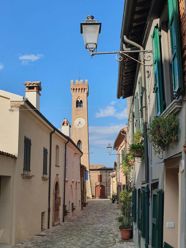 Belltower and pretty street in Santarcangelo